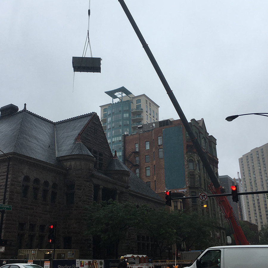 Heavy crane involved for restaurant installation at Tao Chicago