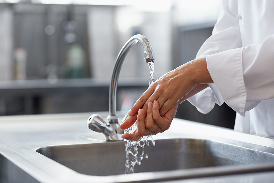 Chef washing their hands