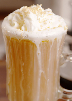 Beerbutter rum drink in a glass mug