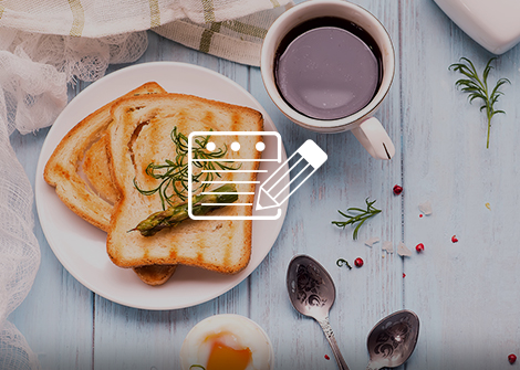 Toast, egg and coffee breakfast on a blue wood table