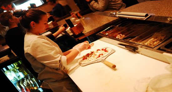 The Pasta House chef making pizza