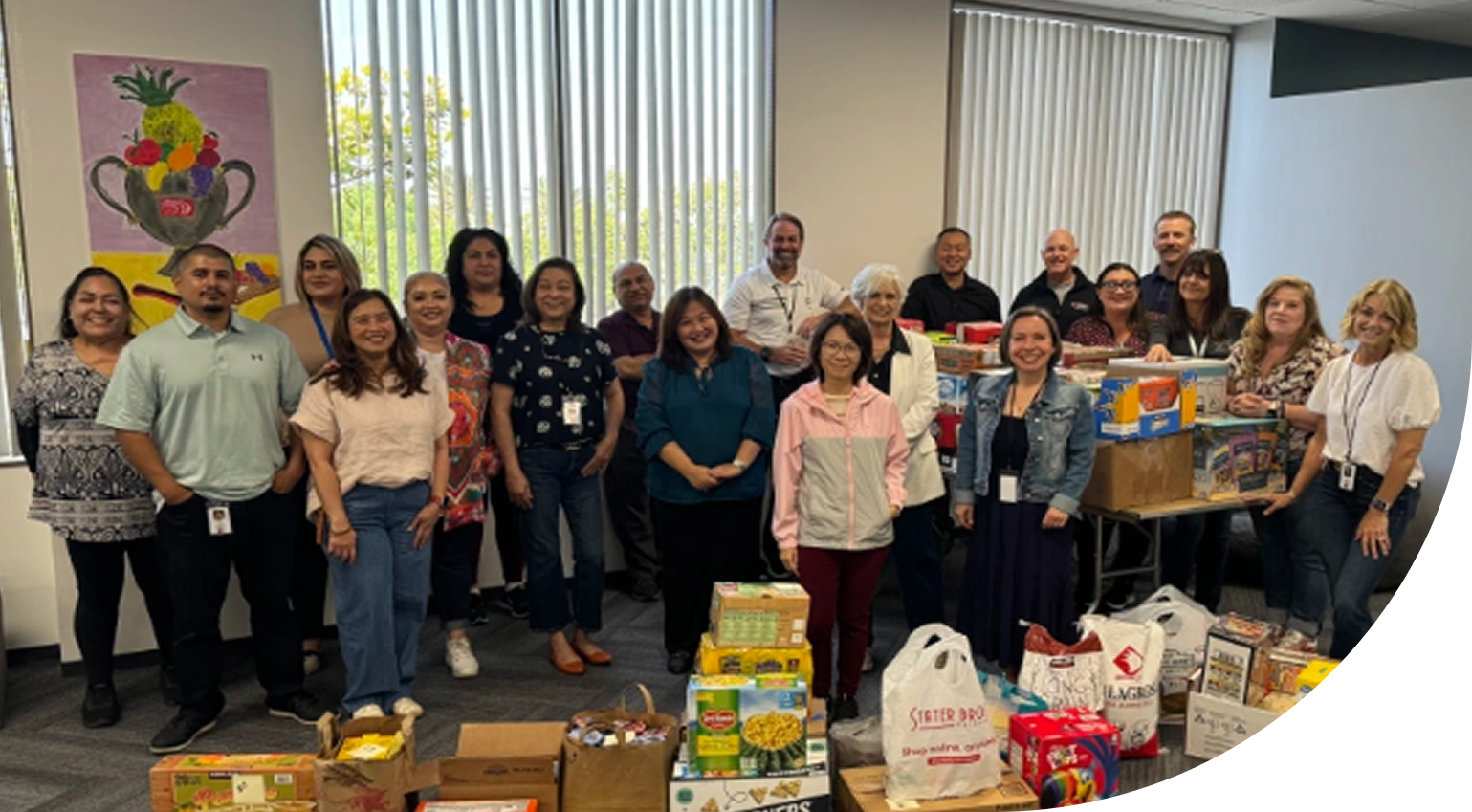 Employees at a food drive